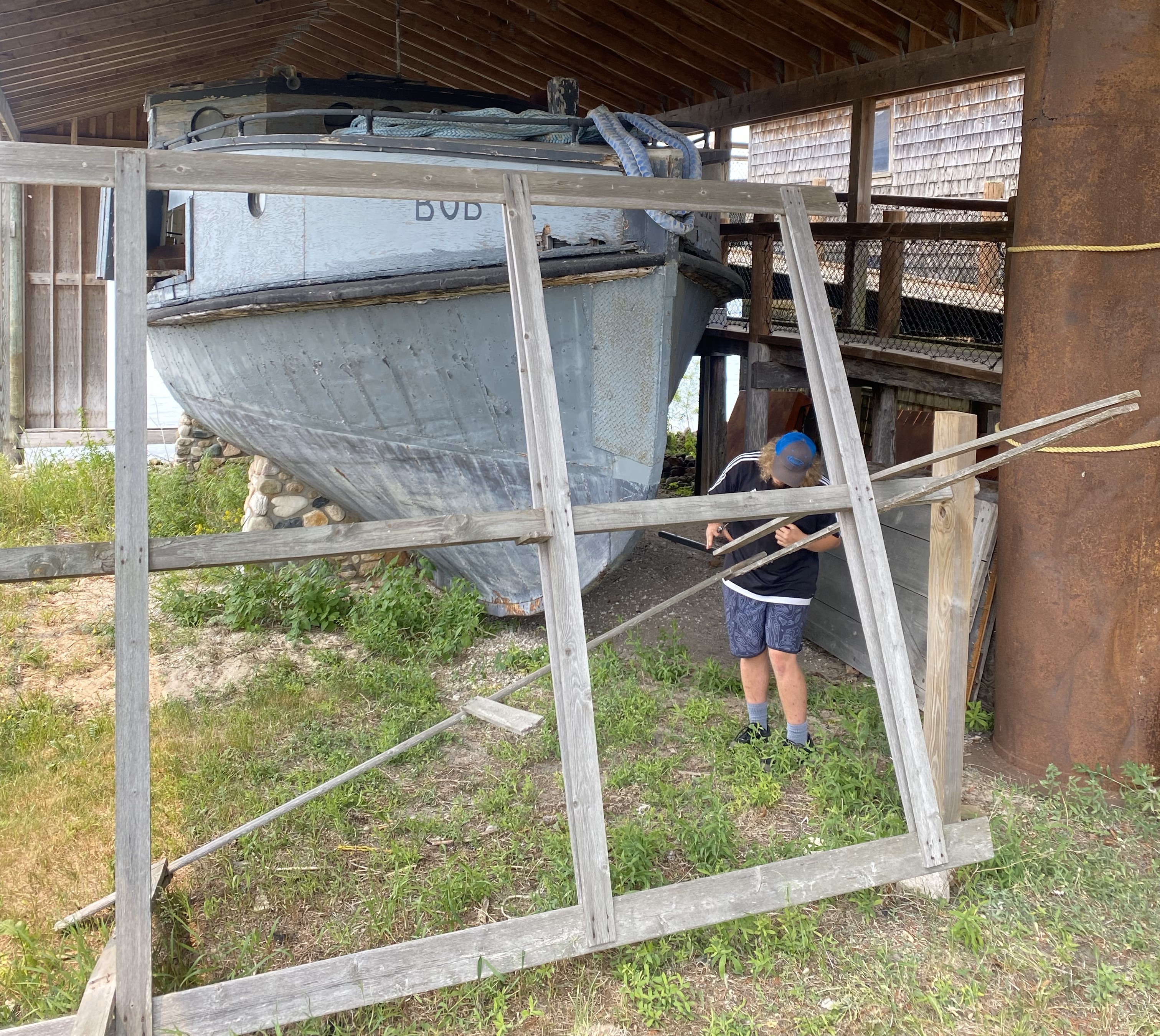 Boat under shelter with frame in front of it